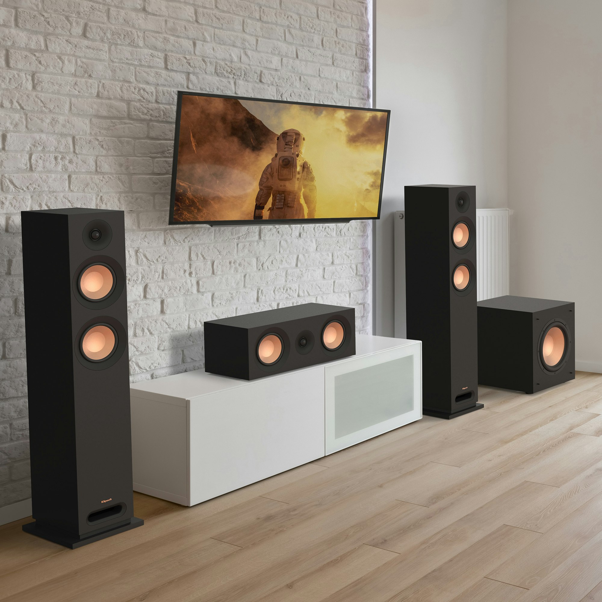 KD Series tower system with grilles off in a living room setting
